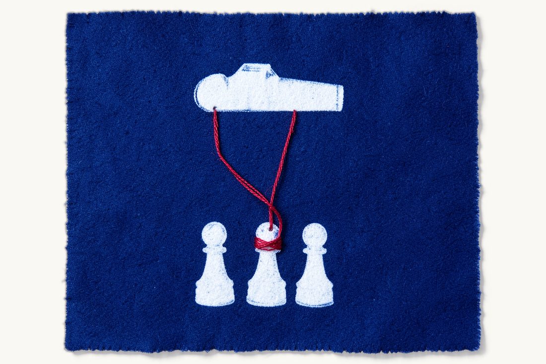 Competition fines and investigations in Türkiye: a large referee's whistle whose red lanyard binds three identical chess pawns standing together, cyanotype print