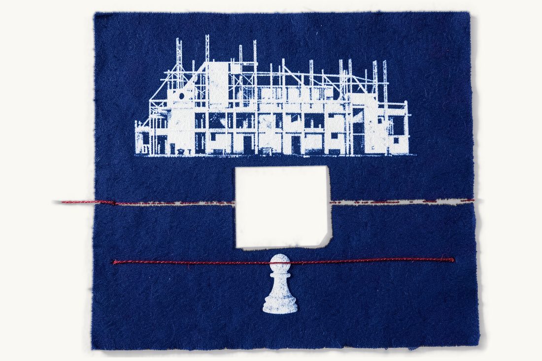 Construction and zoning law in Türkiye: a large building under scaffolding above two parallel red thread lines, a blank folded sheet on the upper line and a chess pawn on the lower, cyanotype print
