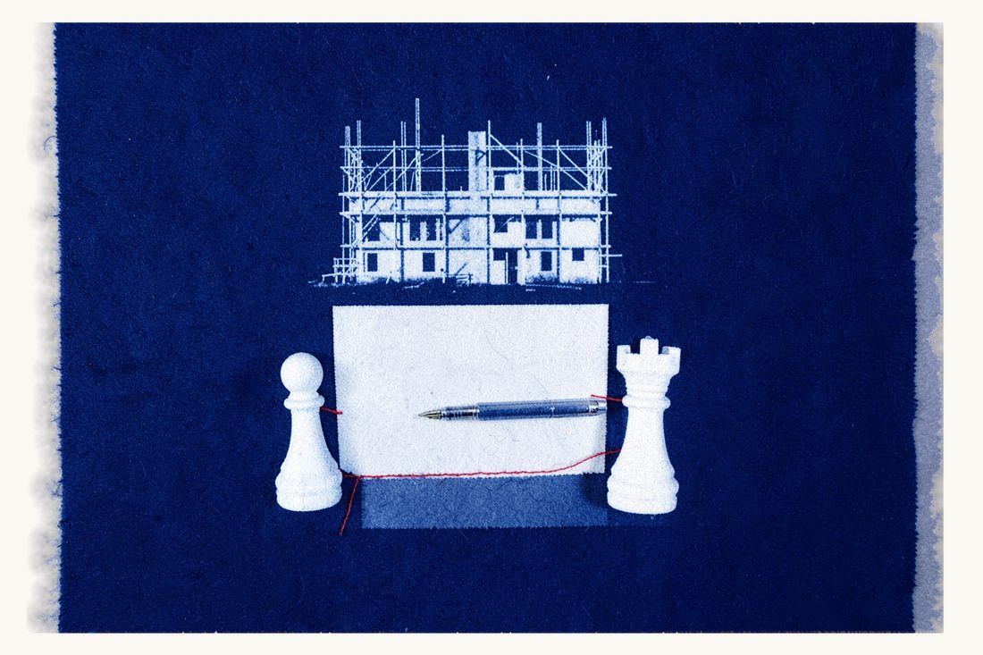 Construction contract disputes involving foreign contractors: a building under scaffolding, a sheet of paper with a fountain pen, and a pawn and a rook linked by a red thread, cyanotype print