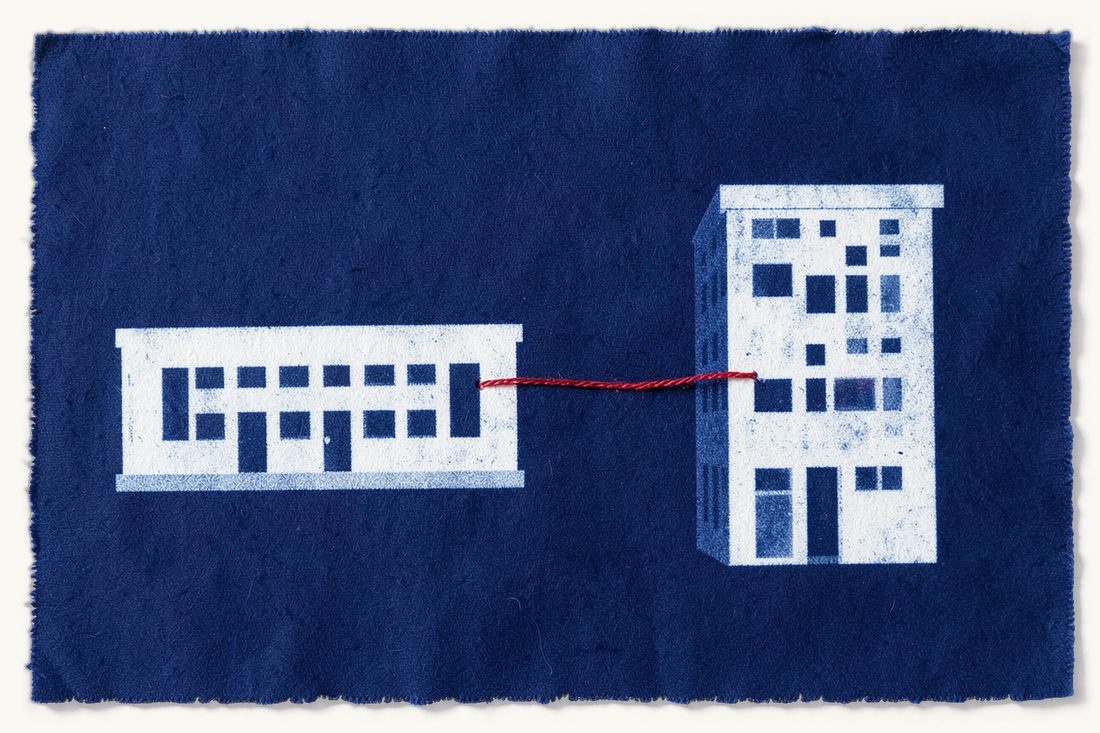 Converting a limited company into a joint stock company in Turkey: a wide low office block and a taller narrower one joined by a single unbroken red thread, cyanotype print