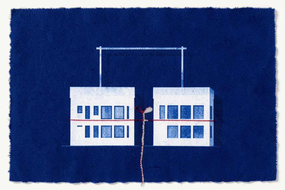 Merger control and turnover thresholds in Türkiye: two office blocks tied together by a red thread, reaching a high horizontal pole set between two stands, cyanotype print
