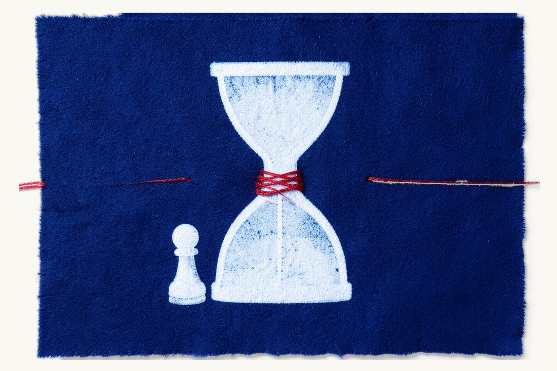 Time and cost of enforcing a foreign arbitral award: a large hourglass wound with red thread and a small chess pawn waiting at its foot, cyanotype print
