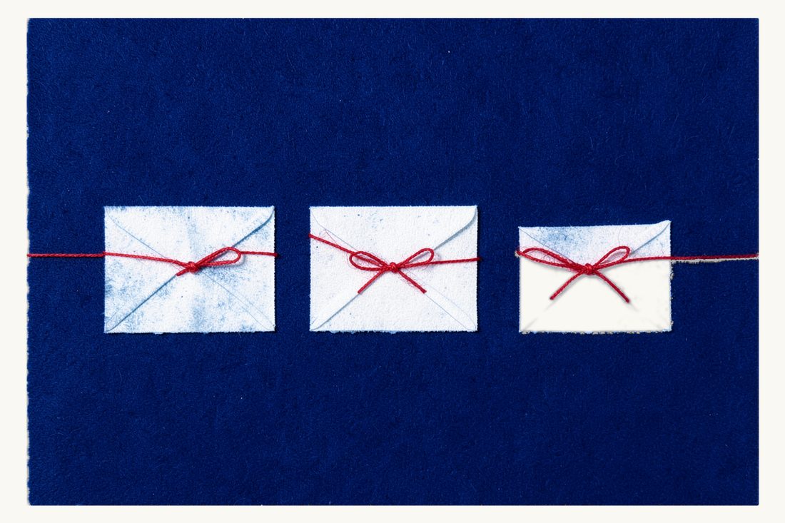 Three separate financial claims in property division: three closed envelopes of clearly different sizes lying apart in a row, each tied with its own small red thread bow, cyanotype print