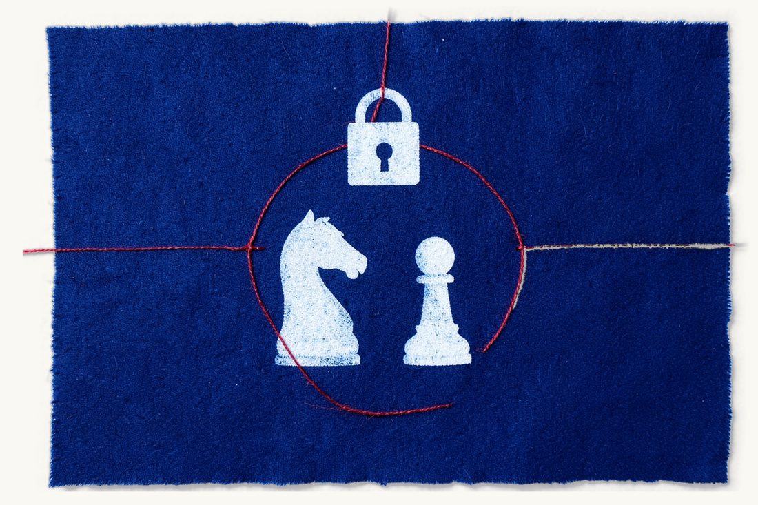 Confidential meetings between a prisoner and a lawyer: a chess knight and a small chess pawn facing each other inside a closed red thread ring fastened at the top with a padlock, cyanotype print