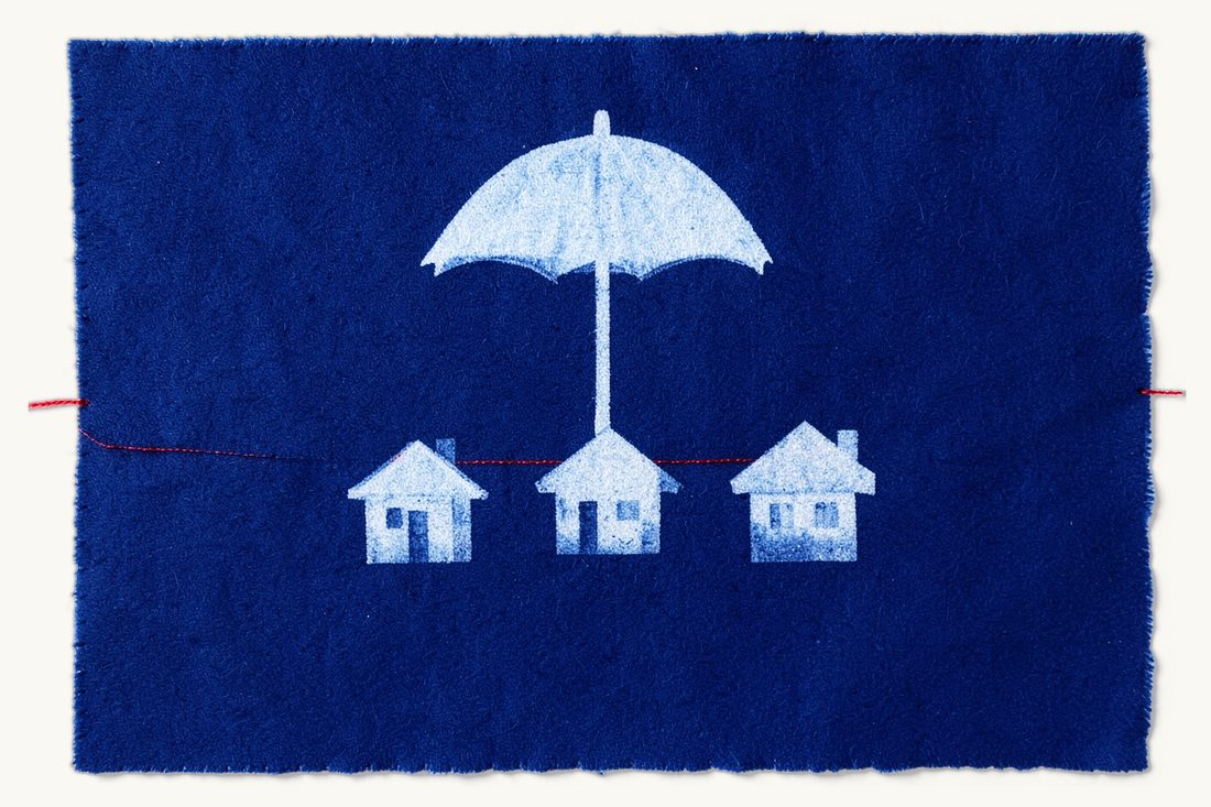 Umbrella structure in real estate investment funds: a large open umbrella sheltering three small pitched-roof houses in a row, with one red thread running beneath them as a single line, cyanotype print