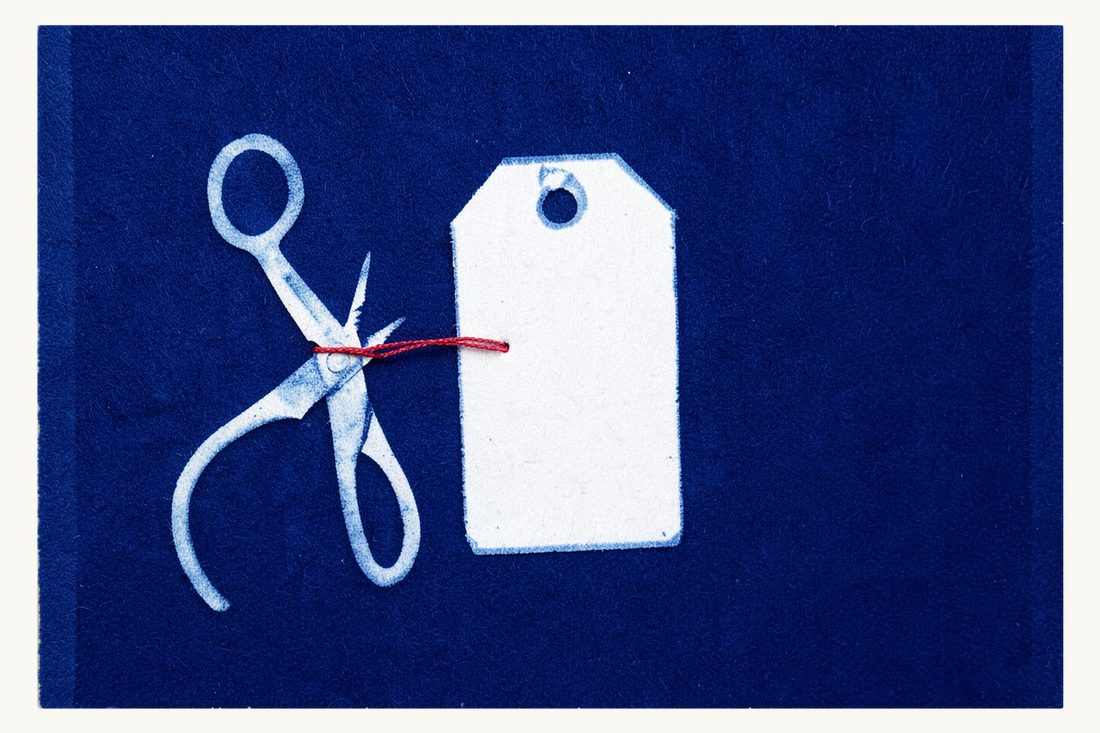 Penalty clauses in Turkish contracts: a large blank price tag tied by a red thread through its hole to a pair of open scissors lying beside it, cyanotype print