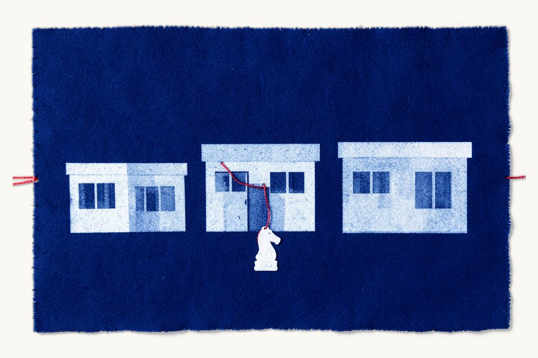 Choosing a corporate structure for a foreign company: three office blocks in small, medium and large sizes, a chess knight in front linked by a red thread to the middle one, cyanotype print