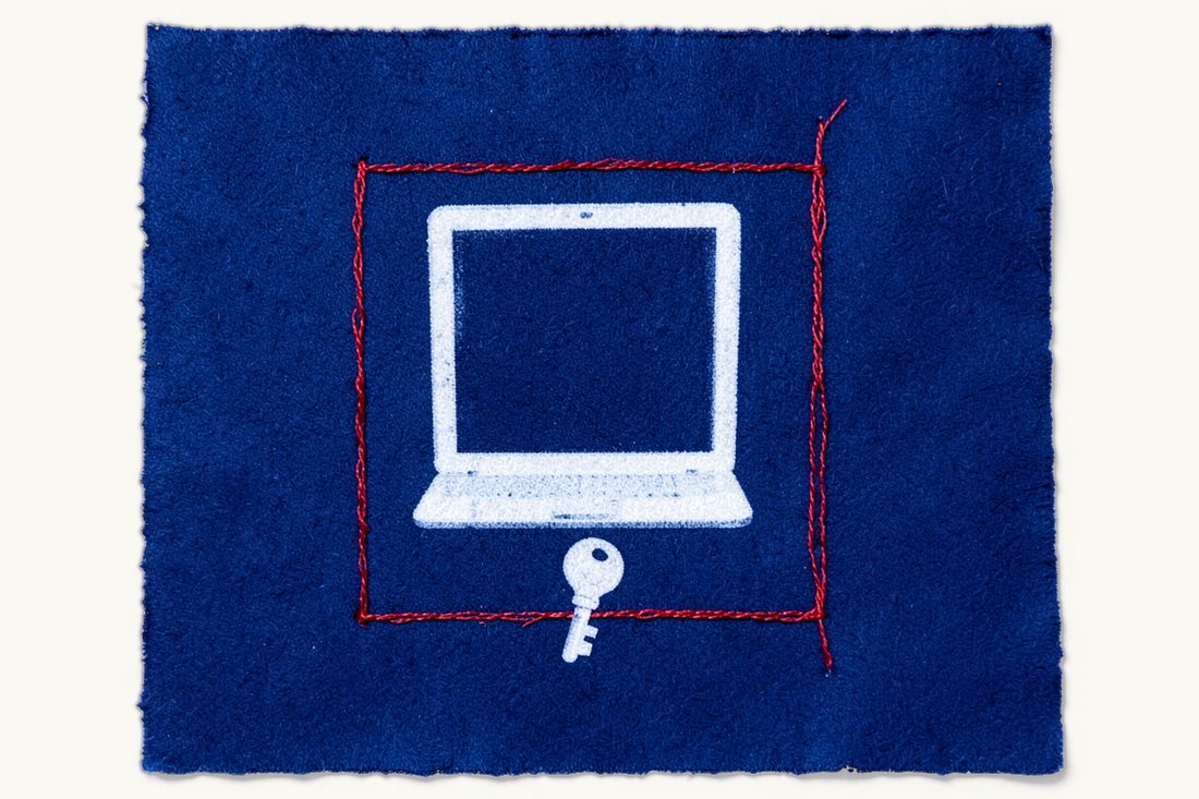 When the crypto-asset law applies to a smart contract: a large laptop with a dark screen inside a closed rectangle of red thread, an old key resting on its lower edge, cyanotype print