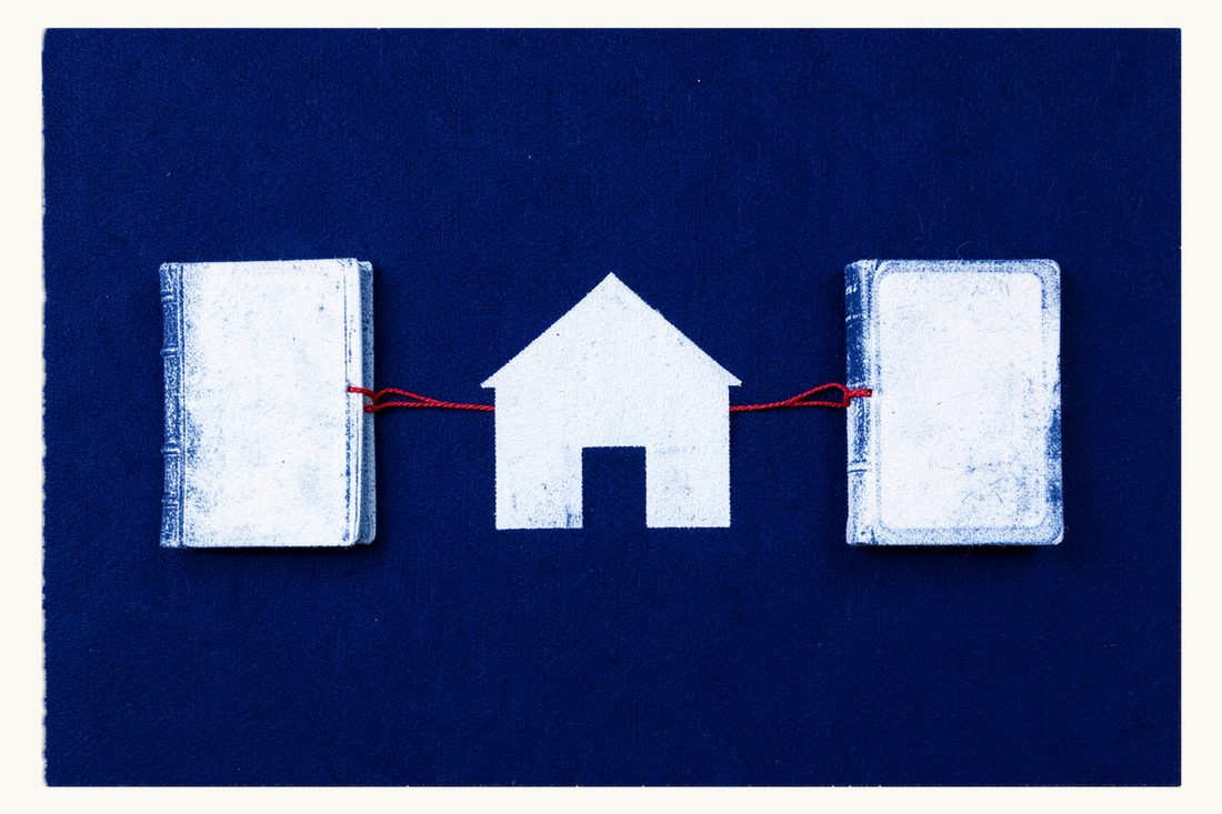 Which law governs the estate: a house in the centre between two thick books, a red thread tied from the house to the left book only, cyanotype print