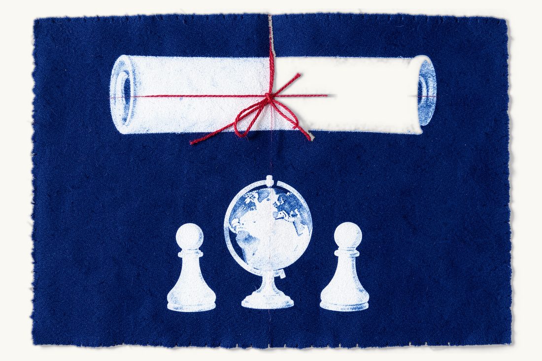 International and domestic commercial arbitration: a large blank scroll tied with a red bow above a small globe between two facing chess pawns, cyanotype print