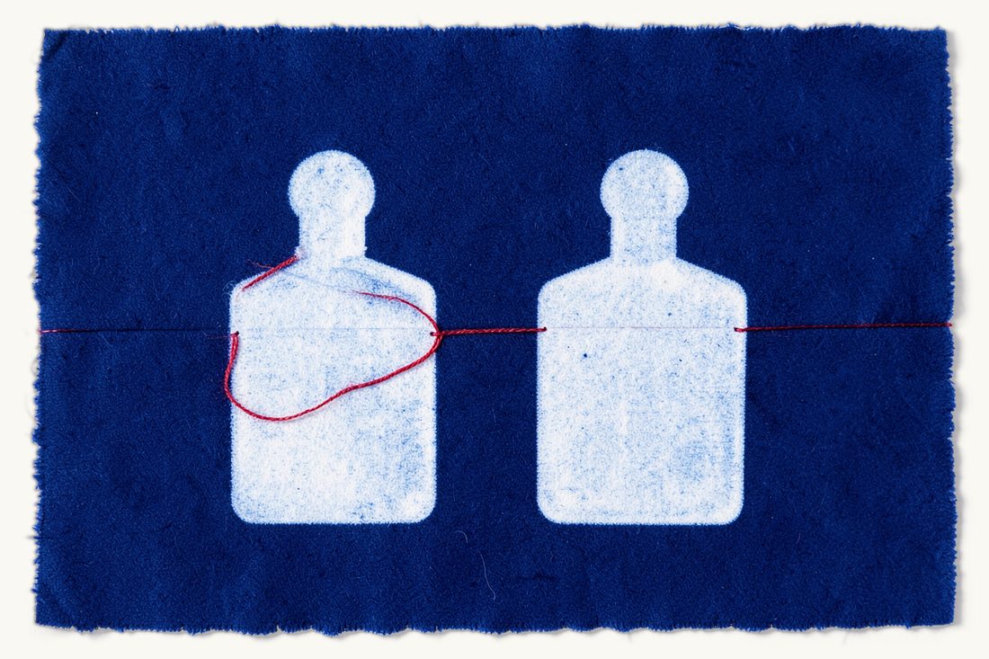 Intellectual property law in Türkiye: two identical plain perfume bottles side by side, the red thread ringing only the original on the left while the copy stands outside, cyanotype print